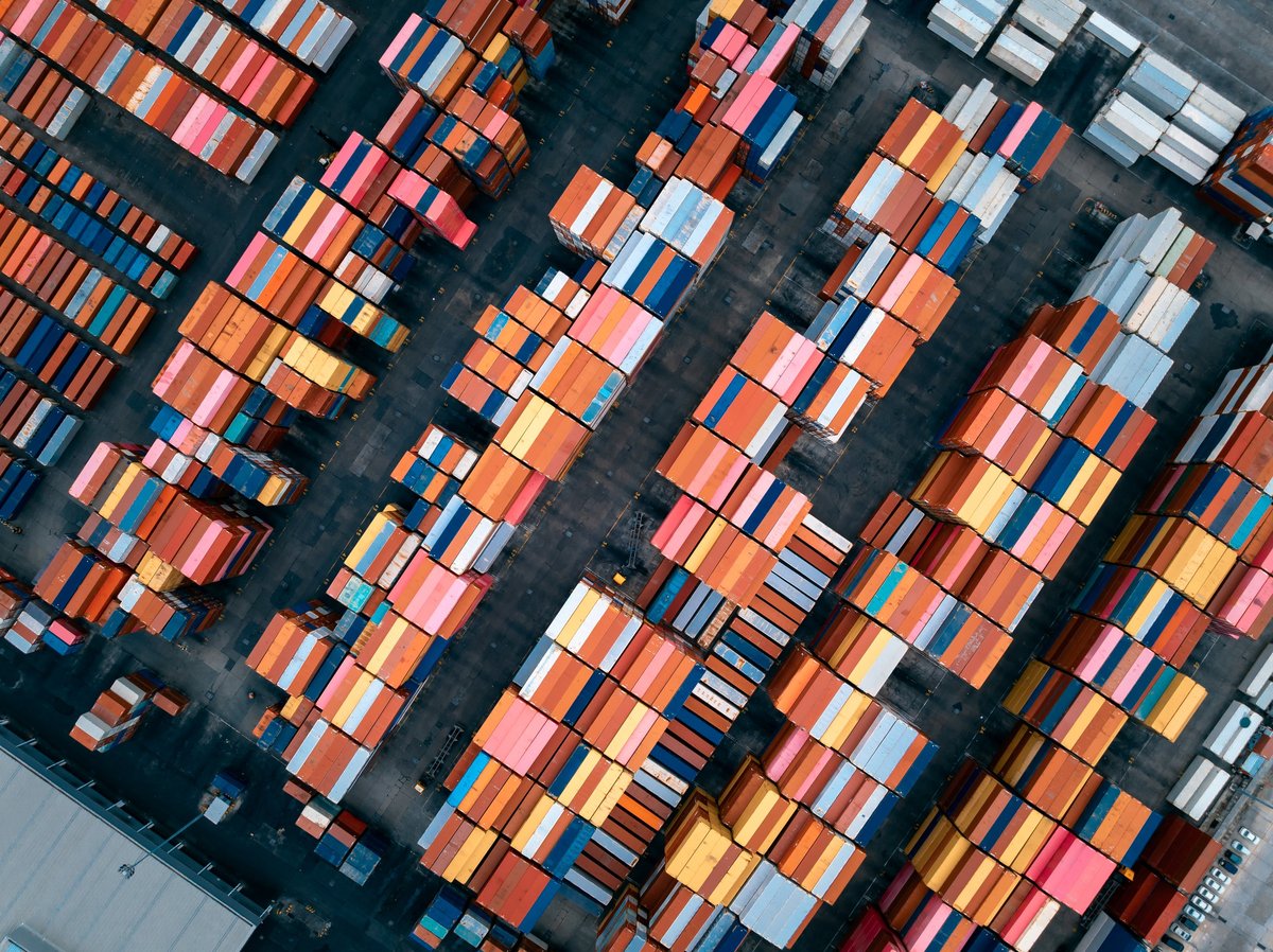 warehouses containers goods stacked lined up for distribution