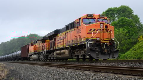 BNSF freight train hauling cargo on railway tracks